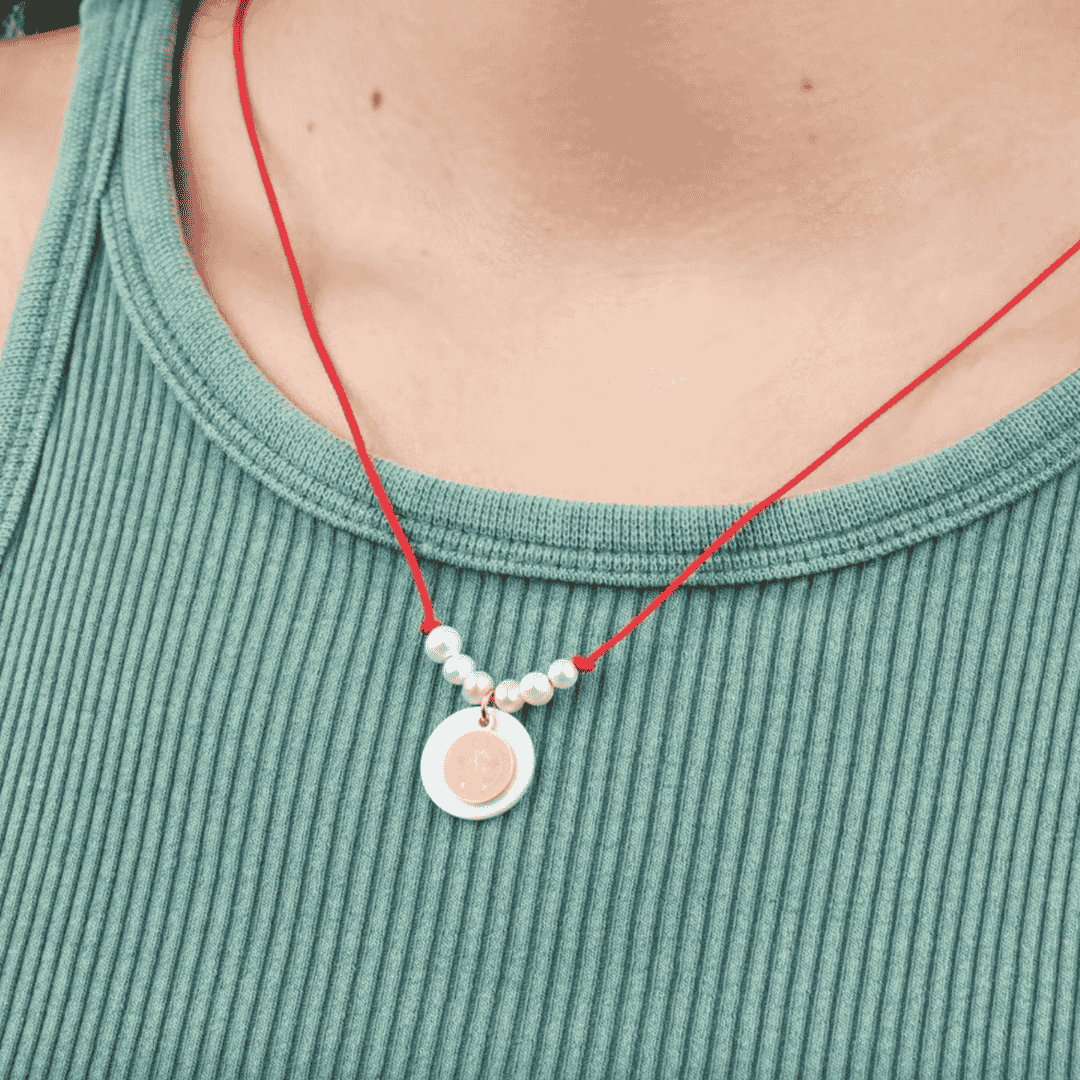 Collar hijo rojo de San Benito